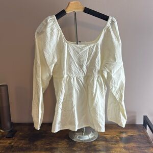 Women’s baby doll long sleeve top.